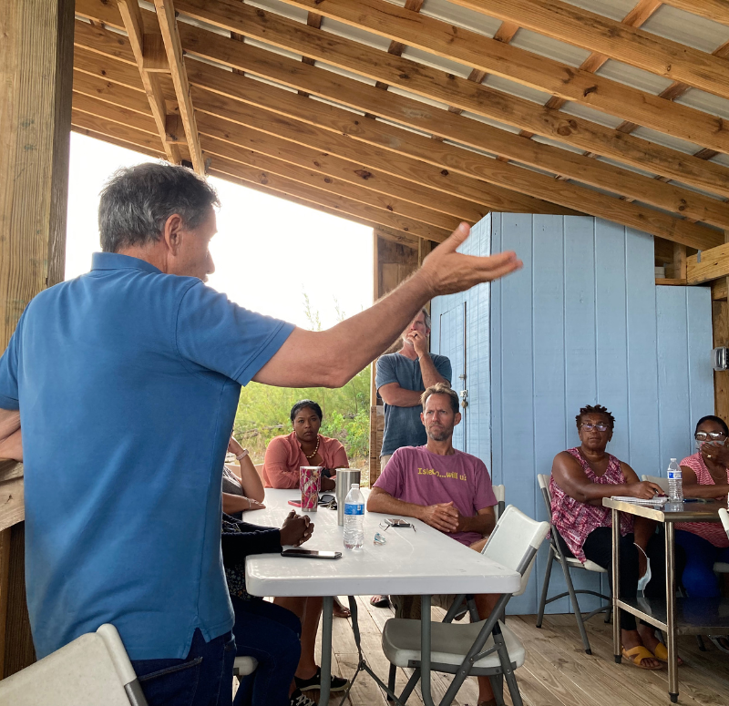 Blue Atlas Project About Values Man In Blue Shirt Teaching Class