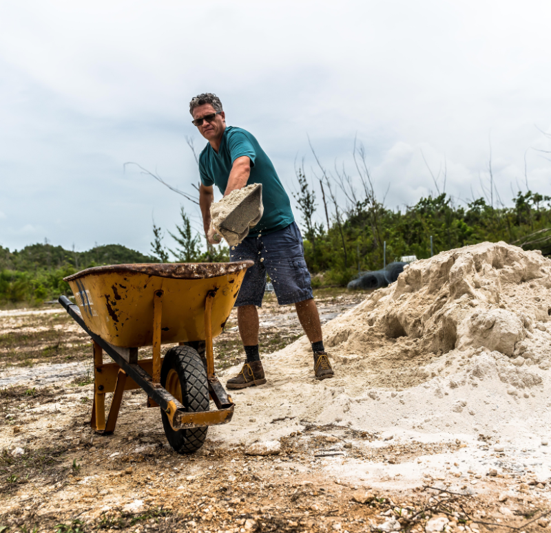 Blue Atlas Project Get Involved Join The Community Man Shoveling Sand