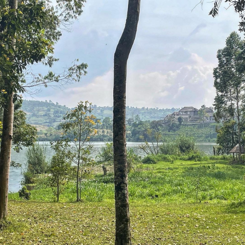 The Blue Atlas Project Get Involved Travel With Us Front photo Distant photo overlooking a lake and homes