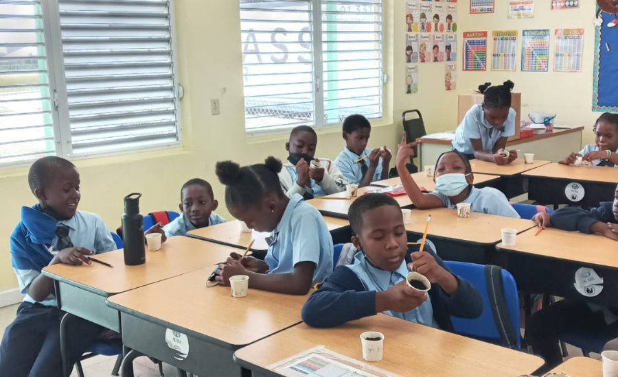 The Blue Atlas Project School and Community Gardens Hero Image Students Labeling seedlings